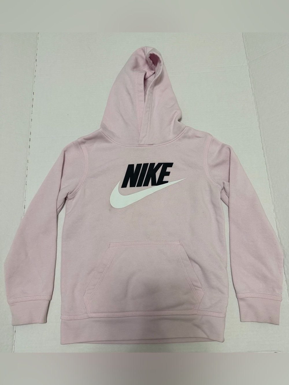 Nike Kids Light Pink Hoodie with Black Logo and White Swoosh